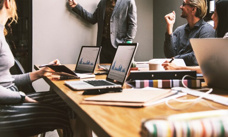 Business team reviewing customer analytics and retention metrics